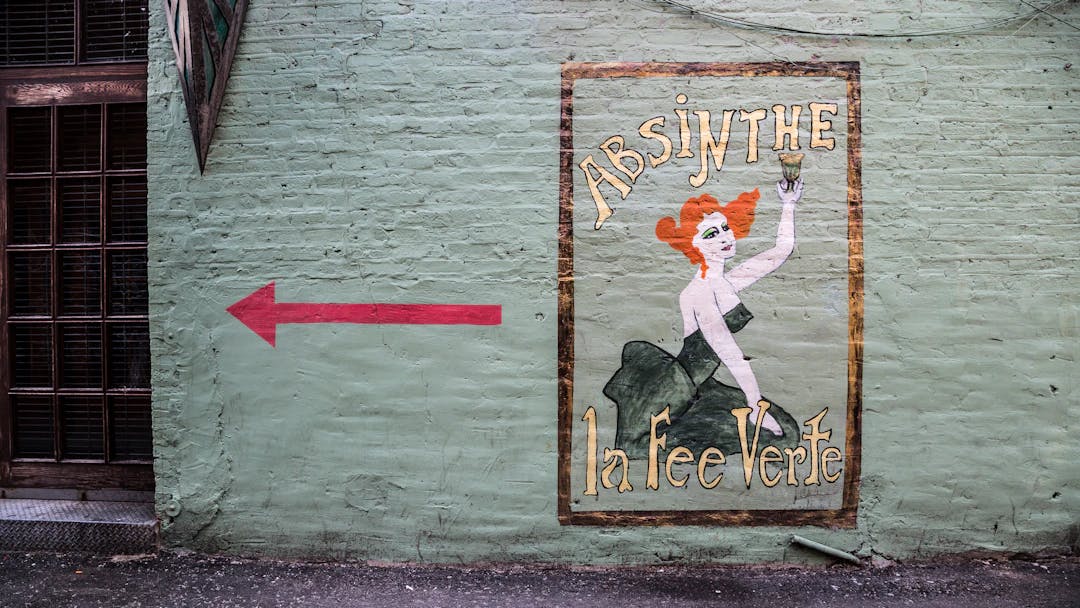 a painted sign on the side of a building