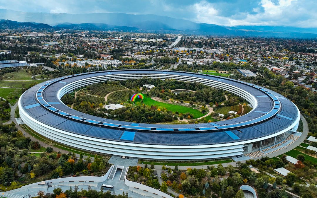 an aerial view of the apple campus in cupert, california