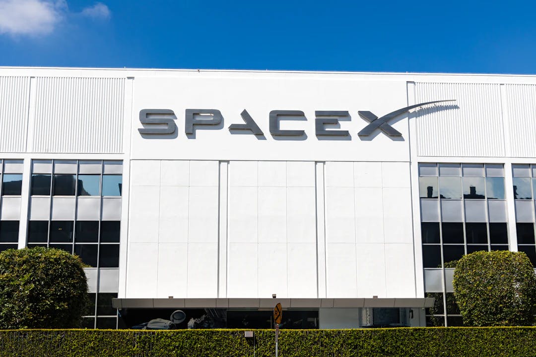 a building with a sign that says spacex on it